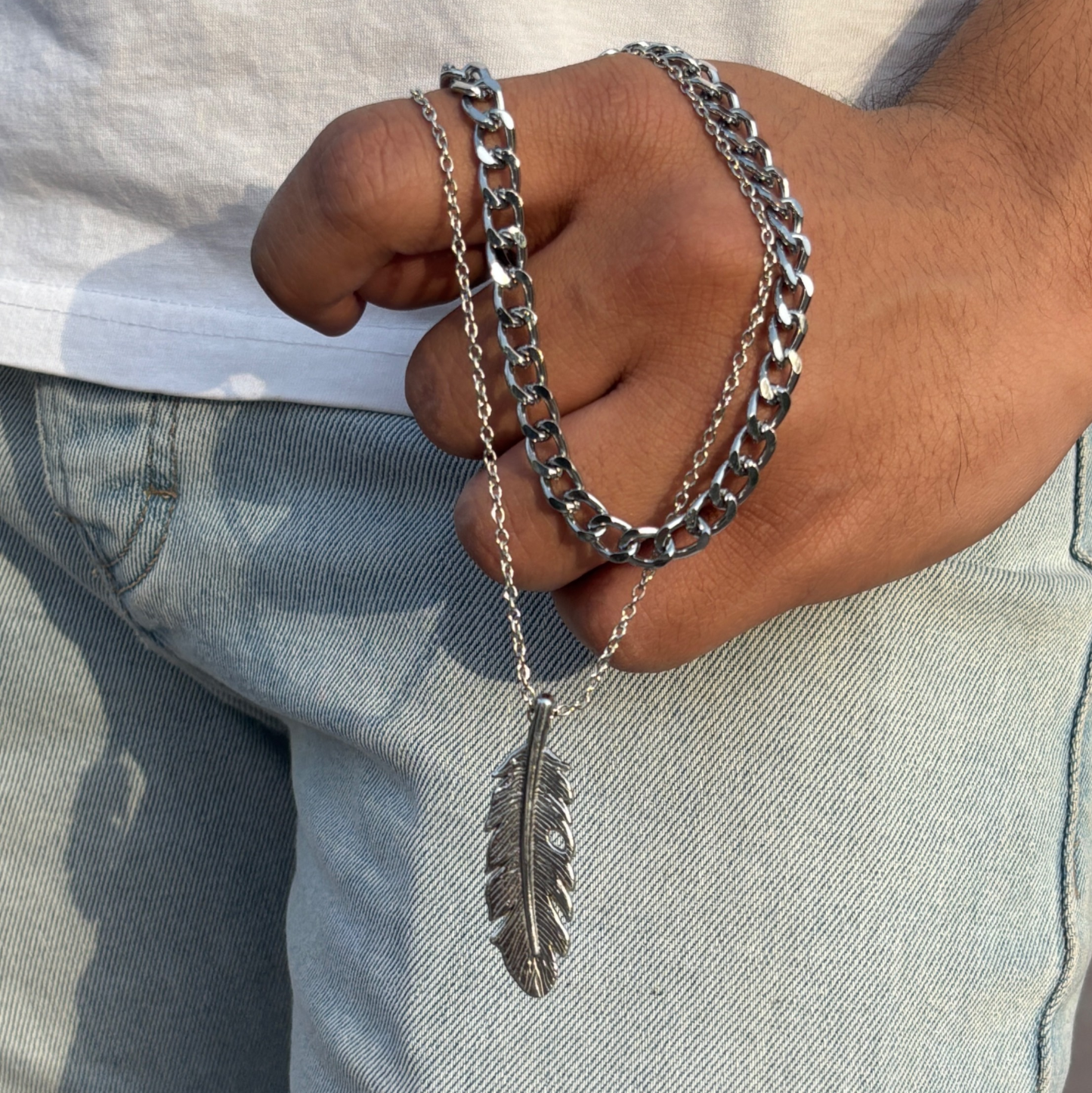 Iconic feather pendant set
