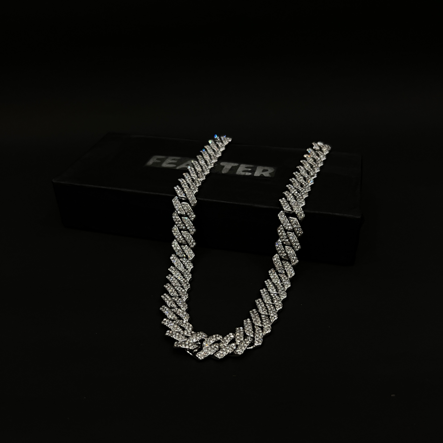 Iced out cuban prism chain