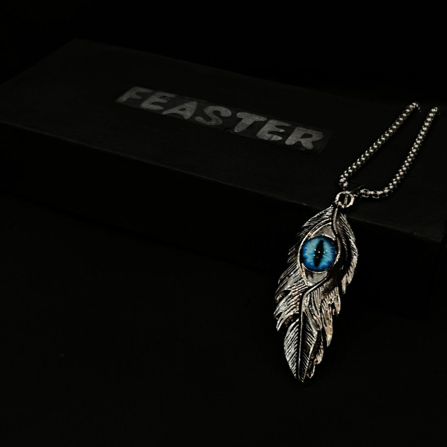 Evil eye feather pendant with chain